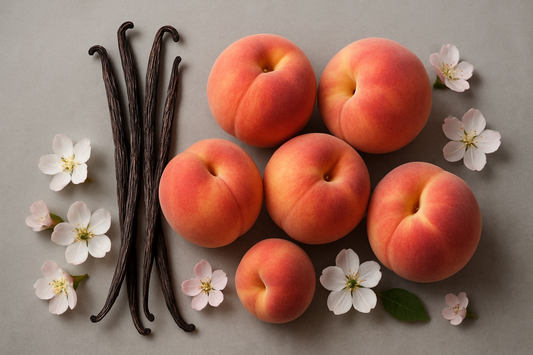 grey background vanilla beans, peaches and blossom